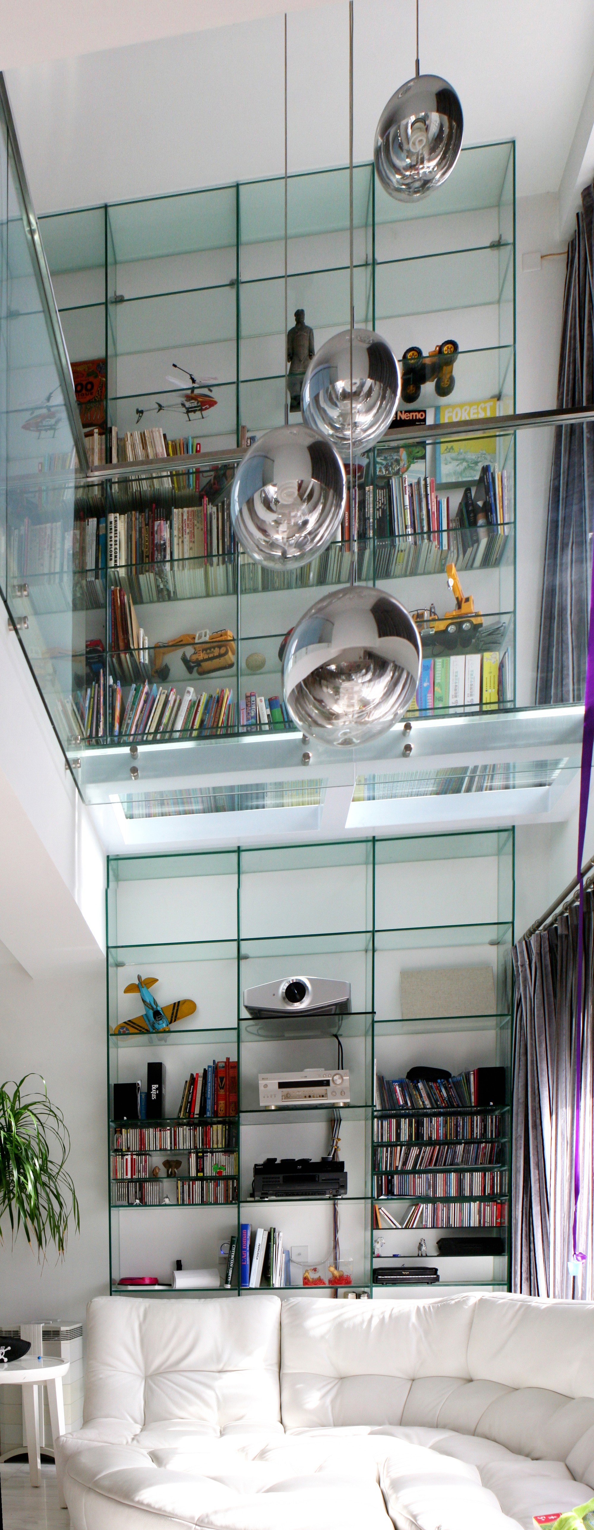 A duplex doubled in size, rebuilt floor by floor over a year