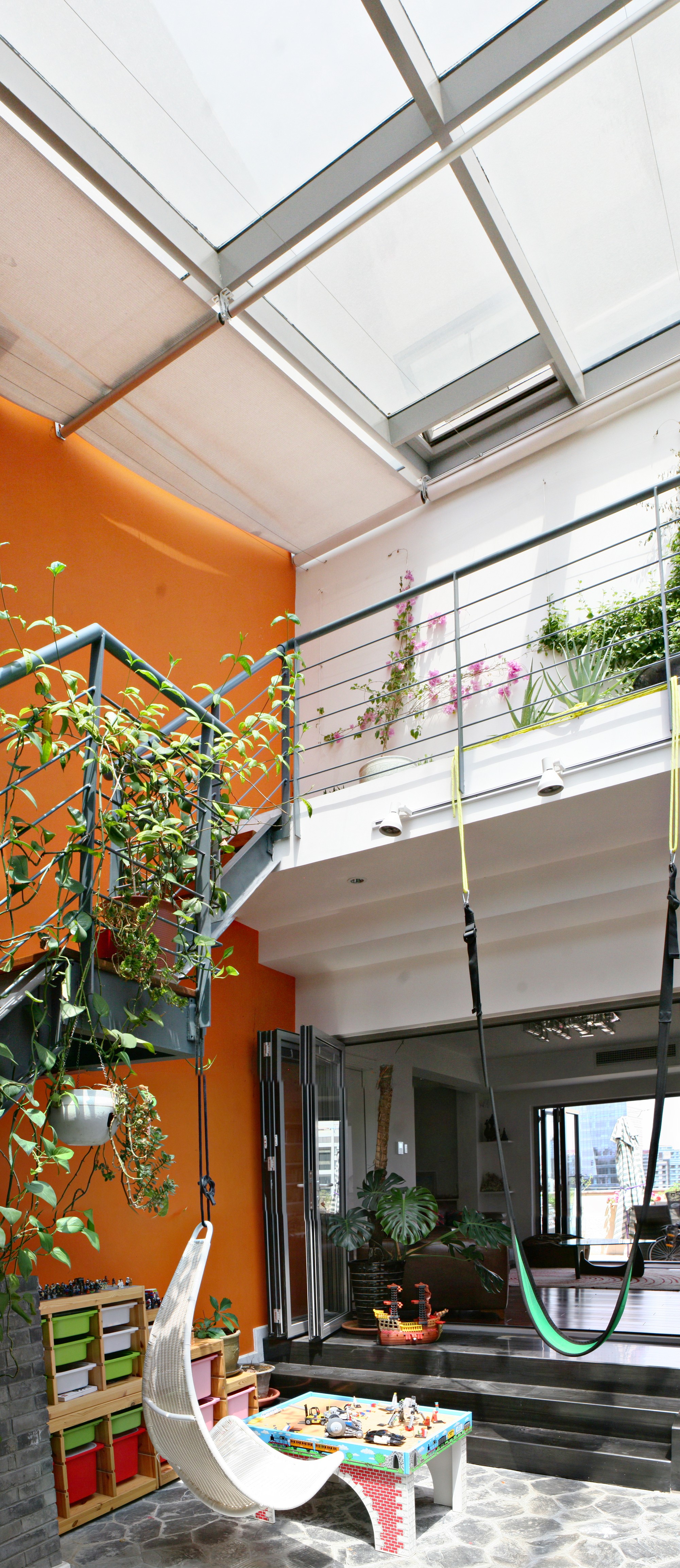 A duplex doubled in size, rebuilt floor by floor over a year