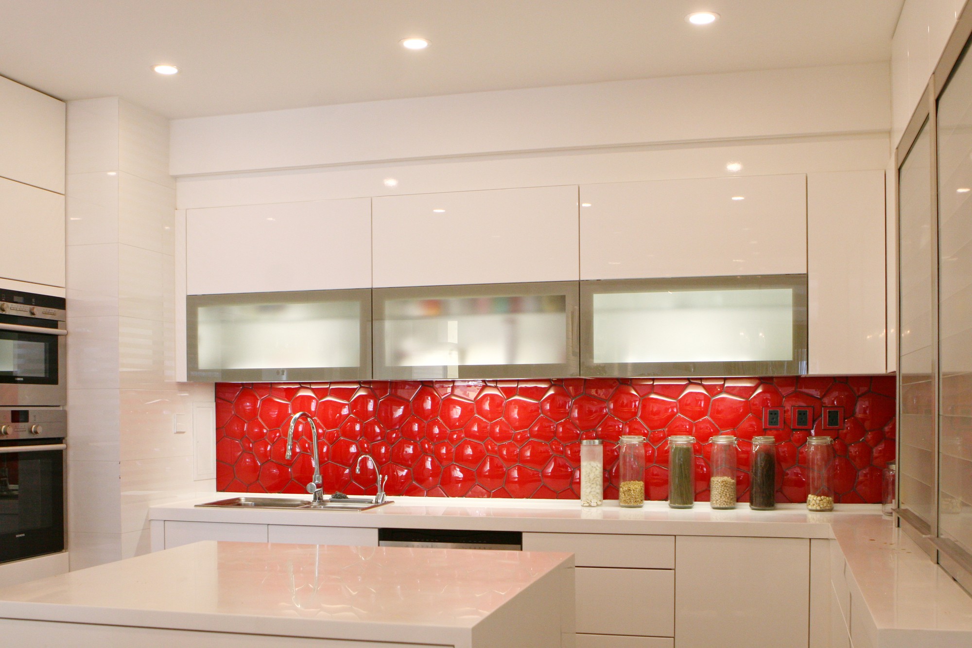 A duplex doubled in size, rebuilt floor by floor over a year