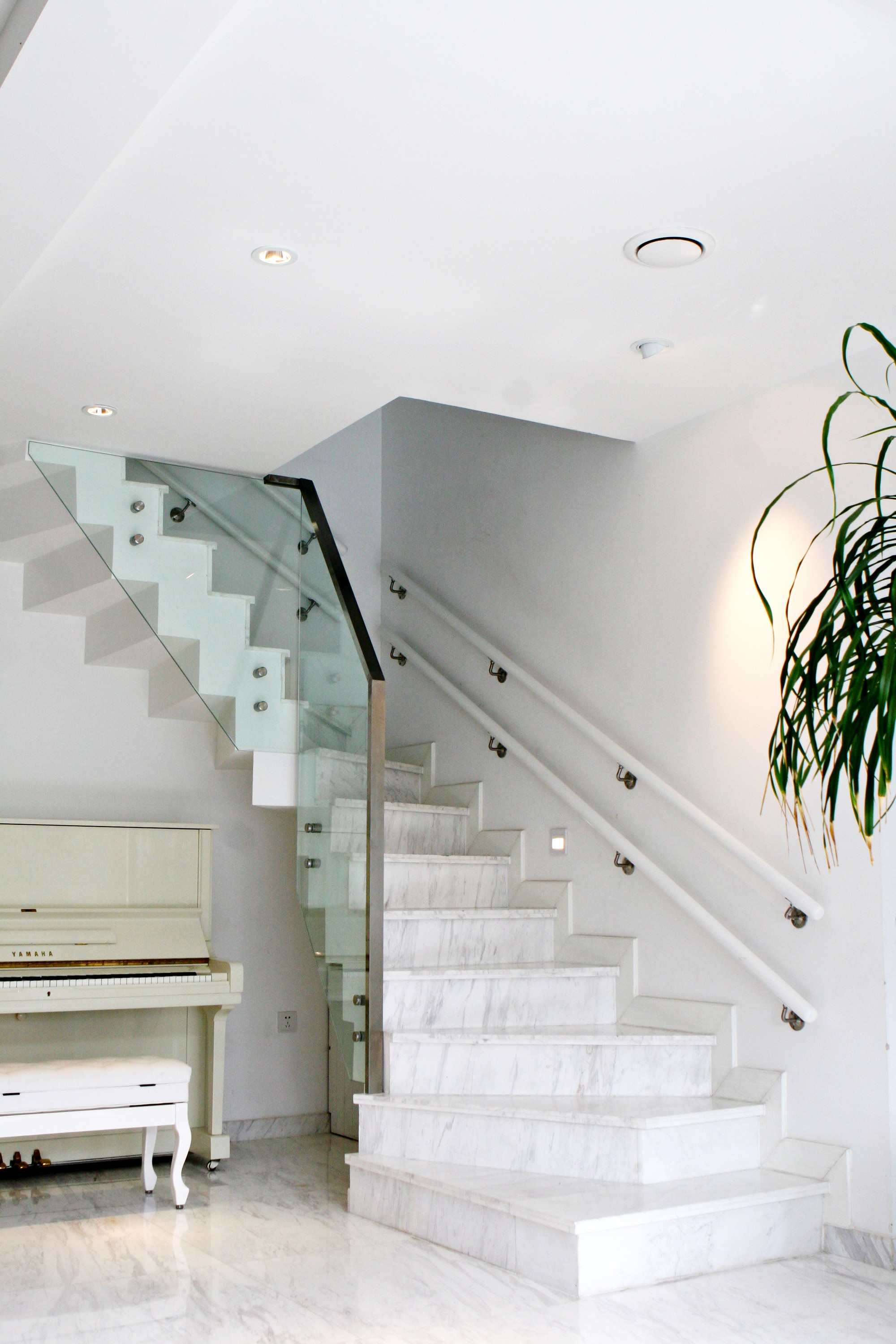 A duplex doubled in size, rebuilt floor by floor over a year